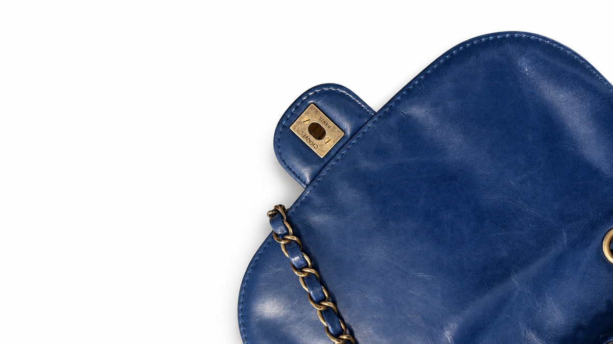 Sac à rabat à bulles en cuir matelassé Chanel CC