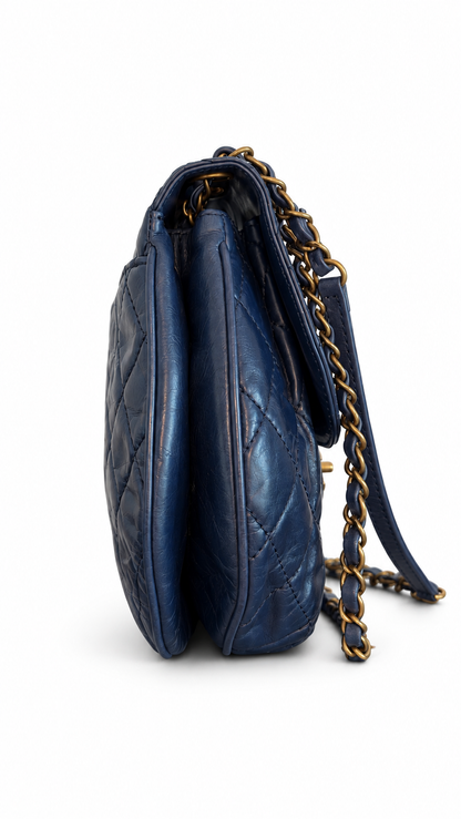 Sac à rabat à bulles en cuir matelassé Chanel CC