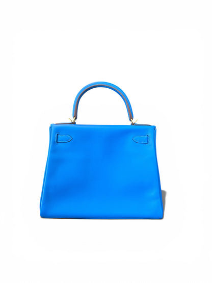 Hermès Kelly 28 Sellier Bleu Zanzibar – Commande Spéciale 2022 – Cuir Swift & Intérieur Jaune cuir togo