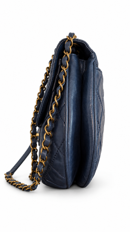 Sac à rabat à bulles en cuir matelassé Chanel CC