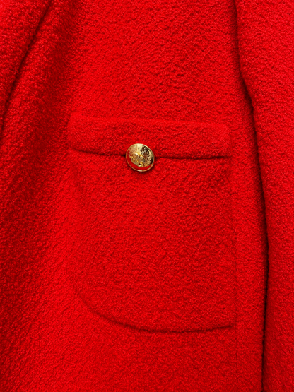 Veste Chanel vintage rouge en tweed bouclé à boutons dorés