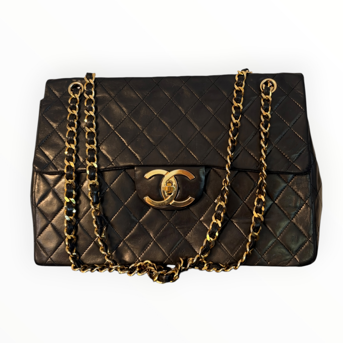 Sac Chanel Maxi Jumbo / Jumbo XL, vintage en cuir noir matelassé – Bijouterie dorée