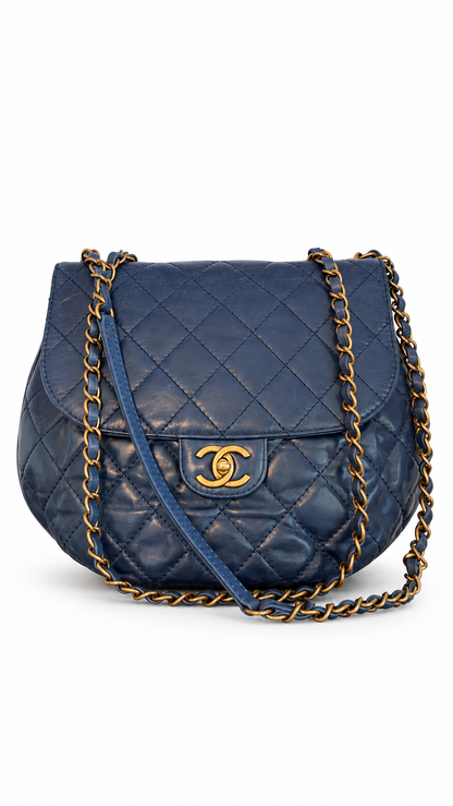 Sac à rabat à bulles en cuir matelassé Chanel CC