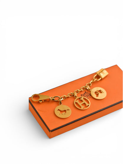 Bijou de sac Hermès – Chaîne métallique dorée