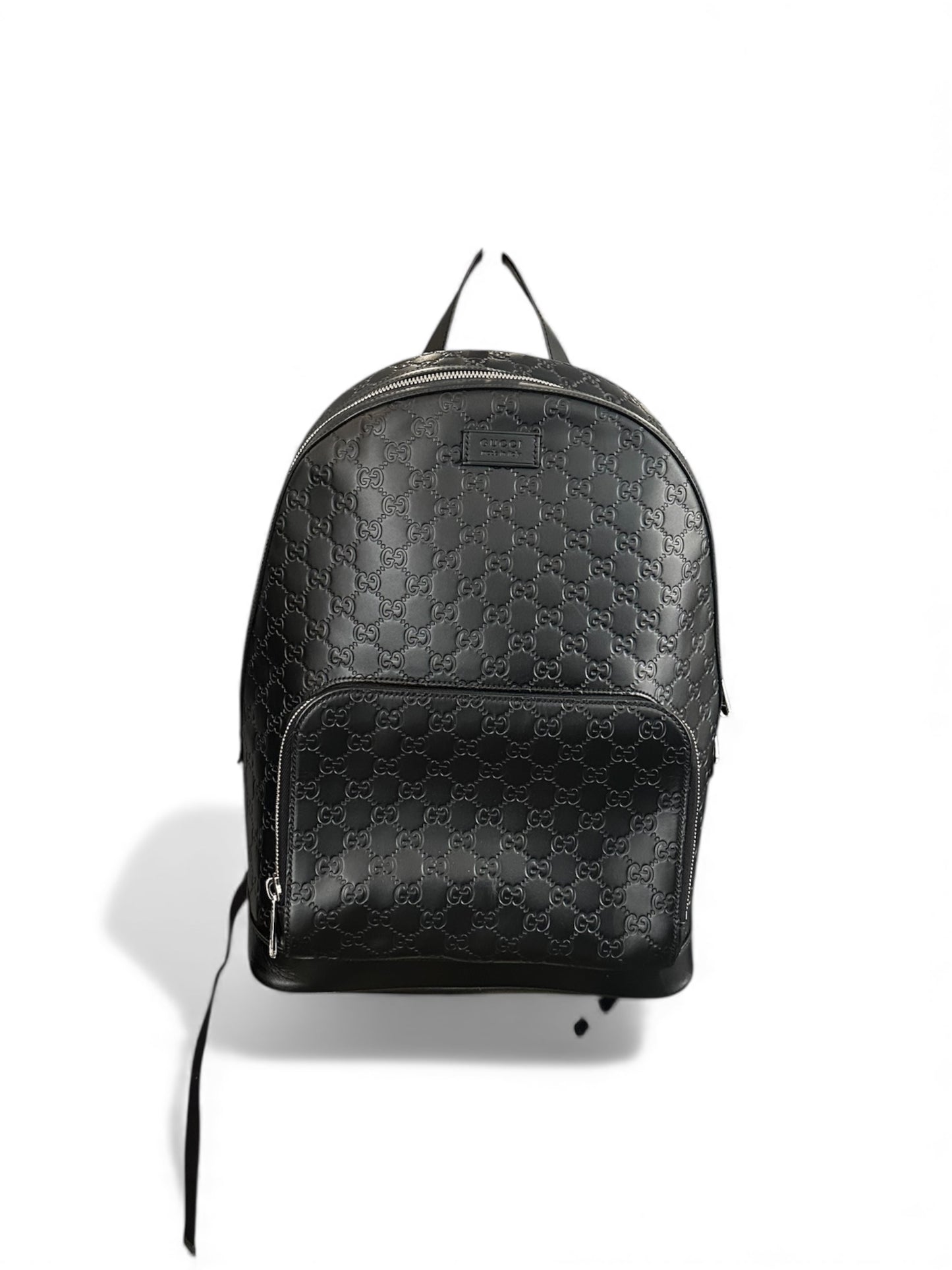 Sac a dos Gucci signature GG Monogram en cuir noir gaufré