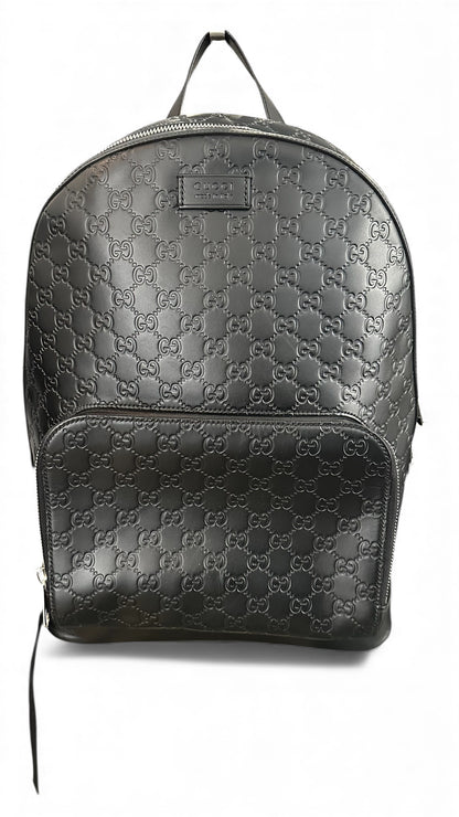 Sac a dos Gucci signature GG Monogram en cuir noir gaufré