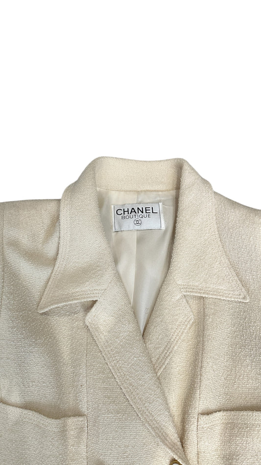 Veste Chanel Boutique en laine écrue – Boutons bijou CC
