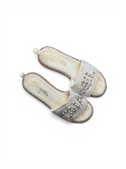 Chanel mules in white tweed