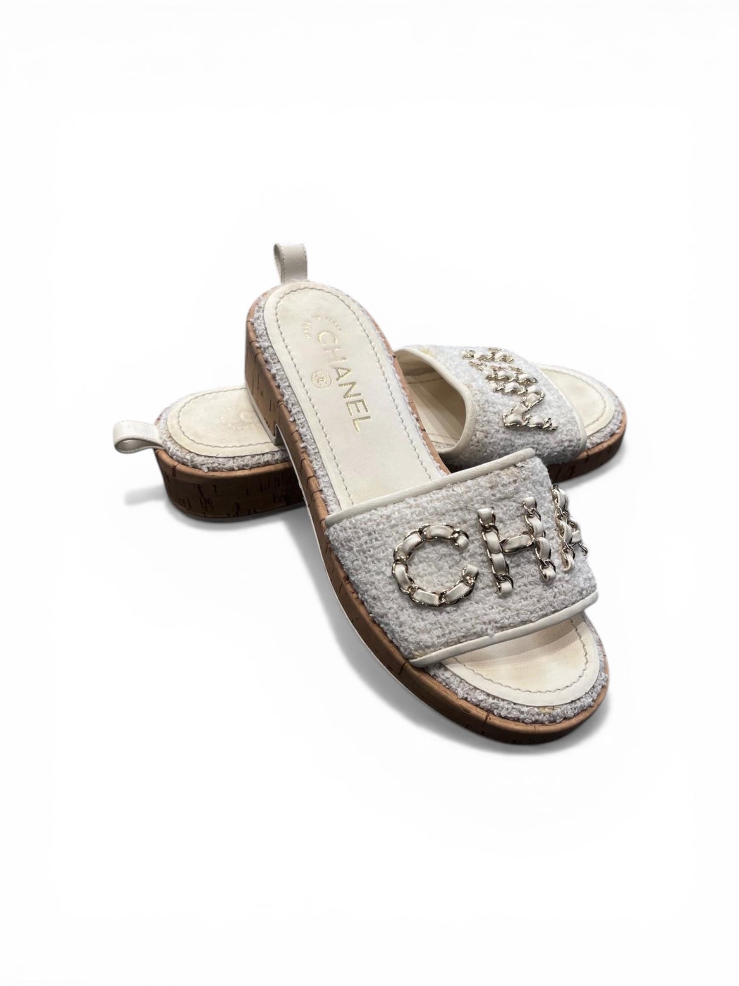 Chanel mules in white tweed